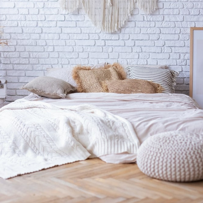 earth tone bedroom with mattress on the floor